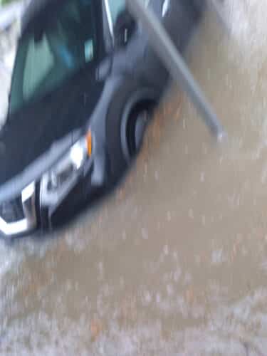 Flooding in the Vincent family carport after Hurricane Delta