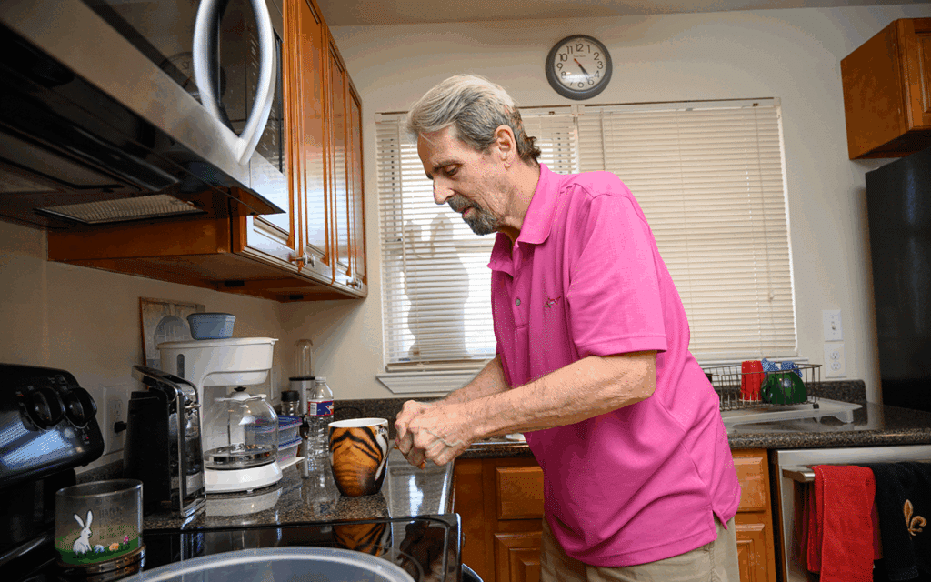 Hurricane Katrina survivor in his kitchen