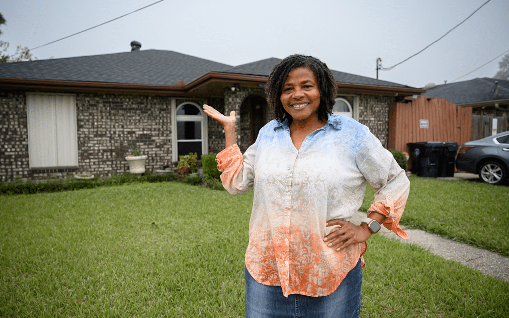 Disaster-impacted homeowner shows the new Fortified roof