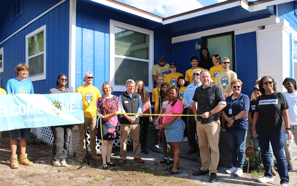 group celebrates rebuilding home of disaster survivor