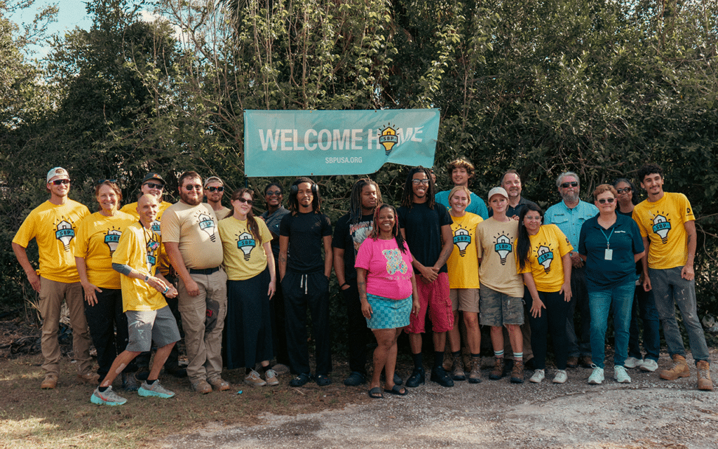 group celebrates rebuilding home of disaster survivor