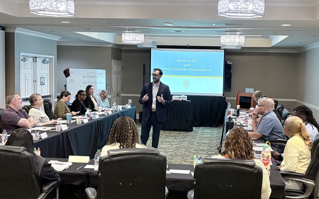 a group of disaster recovery professionals at a training course